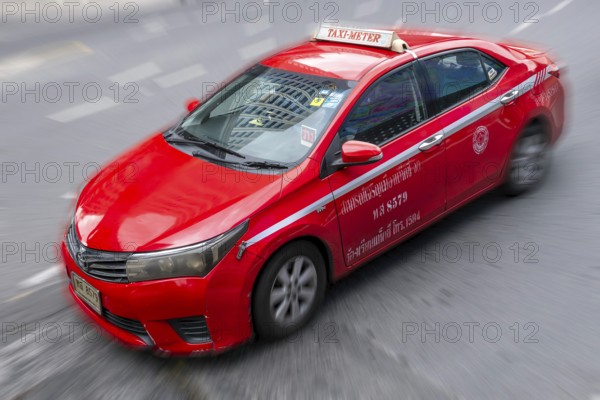Wipe clean street traffic taxi, Bangkok, Thailand