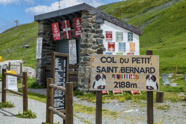 Sign in French with the inscription Col du Petit Saint Bernard and altitude 2188 metres at the top of the Little Saint Bernard Pass in the Alps, Savoie department, France