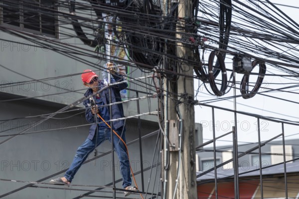 Craftsman welding metal rods, Bangkok, Thailand