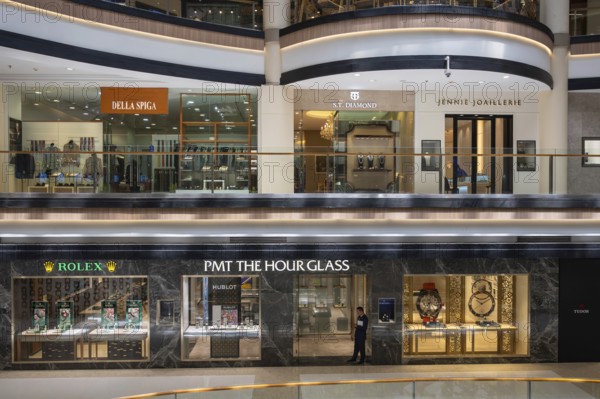 Watch and clothes shop window, Bangkok, Thailand