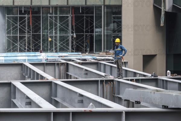 Iron girder construction worker, Bangkok, Thailand