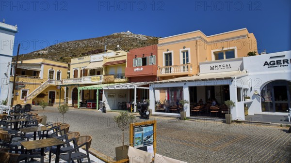 Colourful town centre with cafés, cobbled streets and sunny skies, Agia Marina, Leros, Dodecanese, Greek Islands, Greece