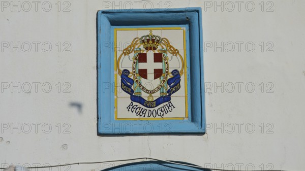 Coastguard, Decorative coat of arms on tiled wall in blue and white tones, Agia Marina, Leros, Dodecanese, Greek Islands, Greece