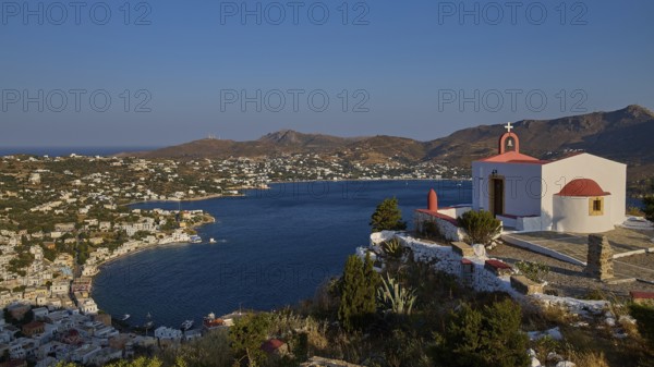 Profitis Ilias Church, Morning landscape with a church overlooking a bay and a village on a gentle hill, Ormos Alintas, Agia Marina, Leros, Dodecanese, Greek Islands, Greece