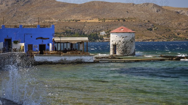 Restaurant Mylos, coastline with a windmill and a blue building by the sea, Agia Marina, Leros, Dodecanese, Greek Islands, Greece