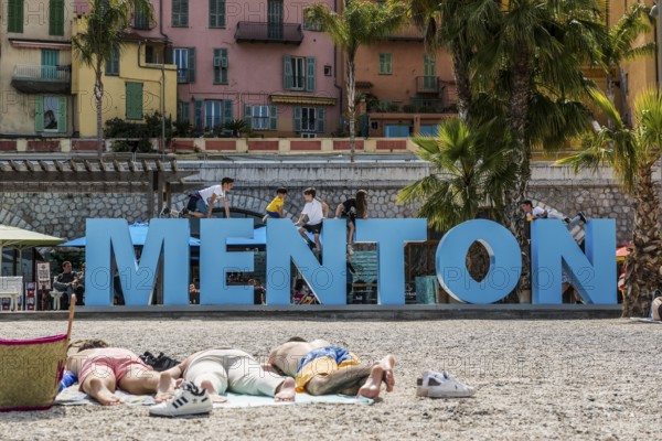 Town with colourful houses by the sea, Plage des Sablettes, Menton, Alpes Maritimes, Provence Alpes Cote d'Azur, French Riviera, South of France, France