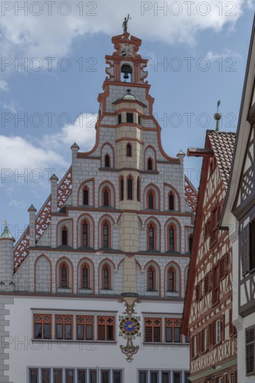 Historic gable of the town hall, built in 1426, historic half-timbered houses on the right, Bad forest lake, Baden-Württemberg, Germany