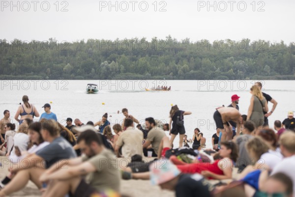 Festival visitors on the beach at the Highfield Festival on Sunday, Lake Störmthal, 18/08/2024