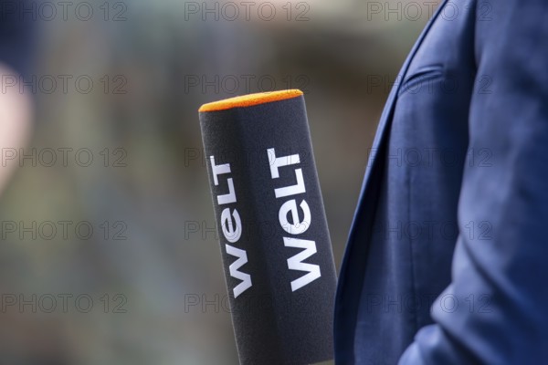 Close-up of a WELT microphone during a TV broadcast