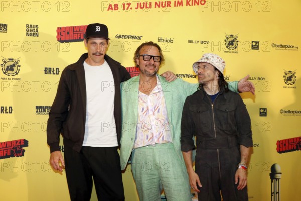 Marxc Hosemann, director Oliver Rihs with songwriter of Schwarze Schafe Tobias Jundt (Bonaparte) at the #SchwarzeSchafe premiere at the cinema in the Kulturbrauerei on 15.7.2025 Berlin