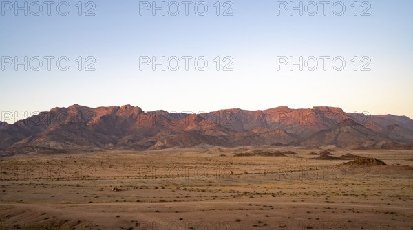 Desert landscape with Brandberg at sunrise, Erongo, Damaraland, Namibia