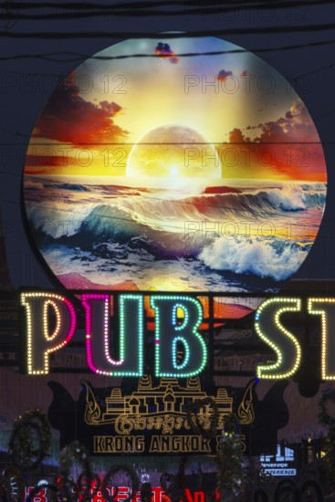 Neon lights, Pub Street in the evening, entertainment district with bars and restaurants, Siem Reap, Cambodia