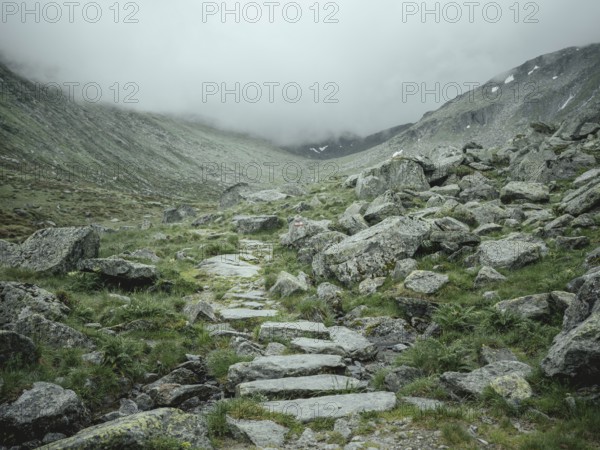 Historical sower's path along which Holocaust survivors travelled from Austria to Italy in 1947 in order to embark for Palestine, Krimmler Tauern, Pinzgau, Salzburg, Austria