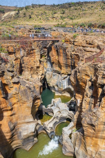 Eroded rock formations, canyon with steep orange-coloured rock cliffs with the Blyde River, Bourke's Luck Potholes, Panorama Route, Mpumalanga, South Africa