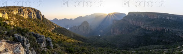 Sunstar, Panorama, Blyde River Canyon with summit Three Rondawels, View of canyon with Blyde River and Table Mountains in the evening light, Canyon landscape, Panorama Route, Mpumalanga, South Africa