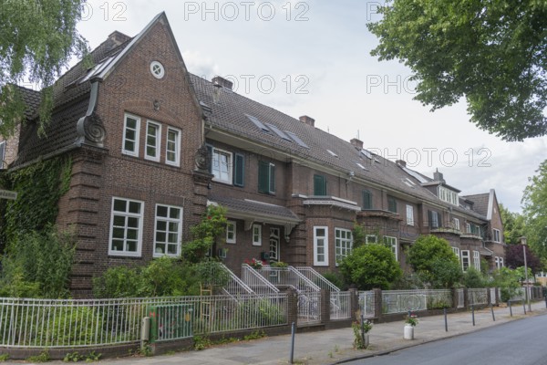 Living in the Weidedamm district, Am Weidedamm, brick architecture, bay window, front garden with trees and plants, steps to the entrance, fence, street, Hanseatic City of Bremen, Germany