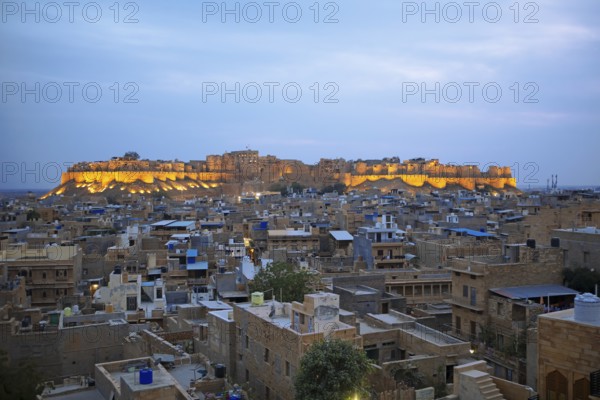 City view Jaisalmer at blue hour, behind the fortress in the light, Jaisalmer, Rajasthan, India