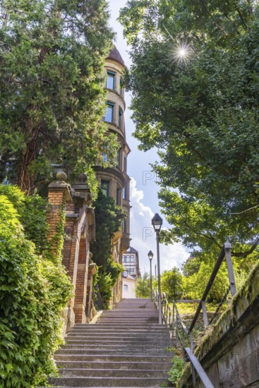 Singing relay at the Schützenplatz in Stuttgart. It is estimated that there are up to 400 Stäffele in Stuttgart. The steps are a shortcut between the half-heights and the city centre. They are also popular as a lookout point or meeting place. The Stäffele are considered one of the landmarks of the state capital. Stuttgart, Baden-Württemberg, Germany
