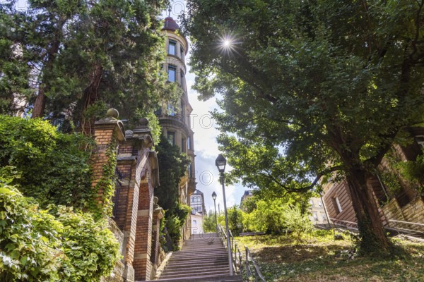 Singing relay at the Schützenplatz in Stuttgart. It is estimated that there are up to 400 Stäffele in Stuttgart. The steps are a shortcut between the half-heights and the city centre. They are also popular as a lookout point or meeting place. The Stäffele are considered one of the landmarks of the state capital. Stuttgart, Baden-Württemberg, Germany