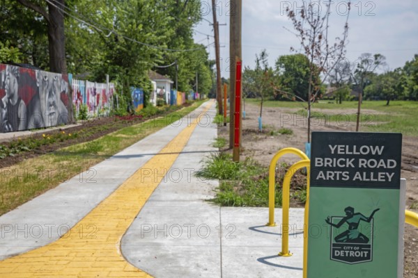 Detroit, Michigan - The city of Detroit is opening nine 'Arts Alleys' in neighborhoods around the city. The Yellow Brick Road Arts Alley provides a space for children to ride their bikes and learn about African-American history