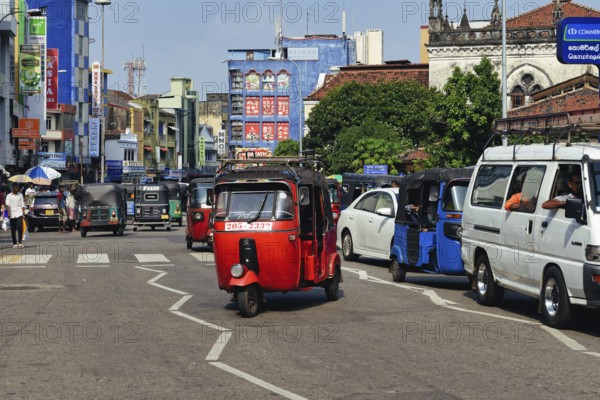 Motorized tuk tuk in a shopping street, Colombo, Sri Lanka