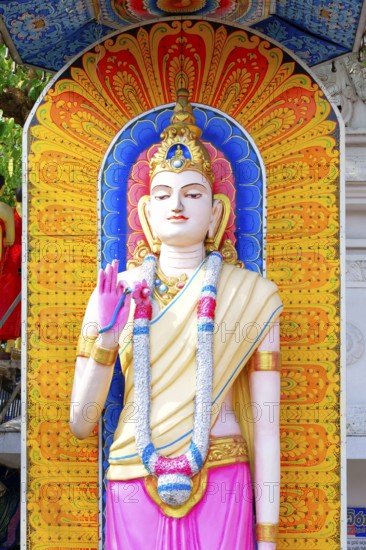 Buddha statue at the entrance of a temple, Colombo, Sri Lanka
