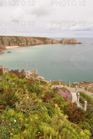 Minack Theatre, spectacular open-air theatre, circular path with lush planting, South England coast, Cornwall, England, GB
