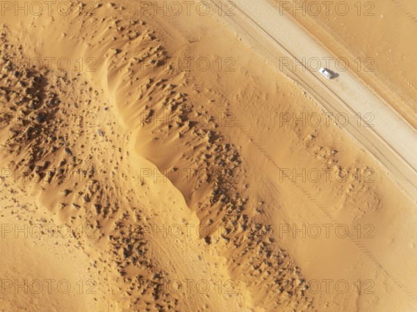 The C14 gravel road at the edge of the Namib Desert. Aerial view. Drone shot. Namibia