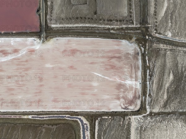 Saline ponds at the salt works of Walvis Bay. Aerial view. Drone shot. Namibia