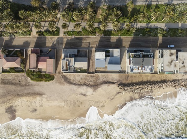 Upmarket seaside villas at the coastal town of Swakopmund between Namib Desert and Atlantic Ocean. Aerial view. Namibia