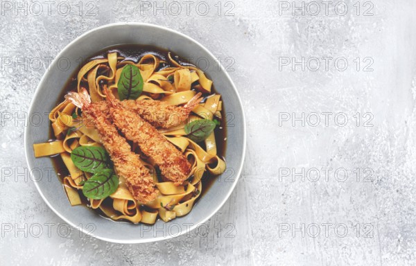 Udon noodles with shrimp in tempura, Japanese cuisine, homemade, no people