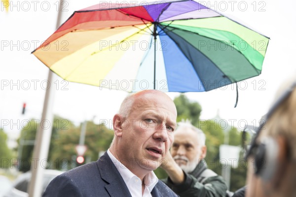 Kai Wegner (Governing Mayor of Berlin) gives interviews after raising the rainbow flag for Pride Week in front of the Rotes Rathaus in Berlin on 9 July 2025