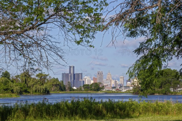 Detroit, Michigan - Downtown Detroit, photographed from Belle Isle in the Detroit River. Lake Muskoday is in the foreground
