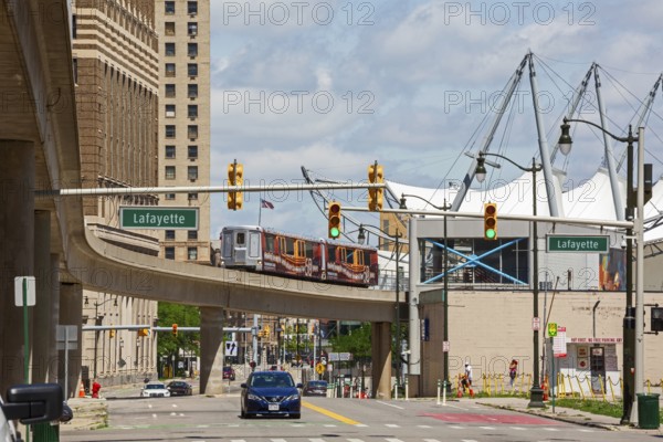 Detroit, Michigan - The Detroit People Mover, a three-mile elevated train that circles downtown. The white canopy in the background is the Rosa Parks Transit Center