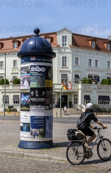 Advertising pillar designed in historical style. Potsdam, Brandenburg, Germany
