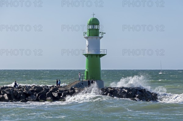 Waves, spray, people, beacon, Warnow estuary, Warnemünde, Rostock, Mecklenburg-Western Pomerania, Germany