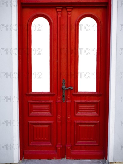 A red entrance door, Mecklenburg-Vorpommern, Germany