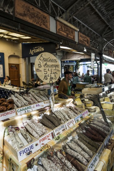 Market stall with jumble, market hall, Marche Provencal, Antibes, Provence Alpes Côte d'Azur, South of France, France