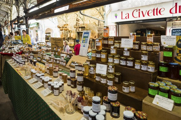 Market stall with honey, market hall, Marche Provencal, Antibes, Provence Alpes Côte d'Azur, South of France, France