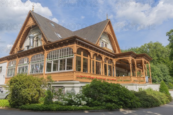 Meierei in the Bürgerpark from 1866, catering, veranda, landscape park with rivers and lakes, garden monument, attraction, recreation, groups of trees, blue sky, city state of Bremen, Germany