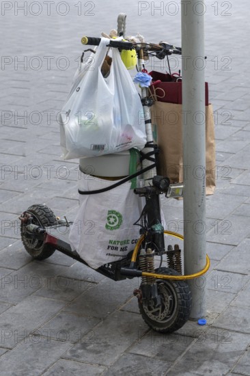 Electric scooter with bags, Abu Dhabi, United Arab Emirates
