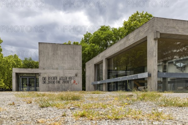 The rich want war. The youth want a future. Illegal protest at a building near the University of Stuttgart. Stuttgart, Baden-Württemberg, Germany