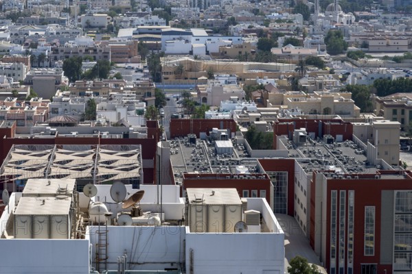Rooftops with satellites and air conditioning systems, Abu Dhabi, United Arab Emirates