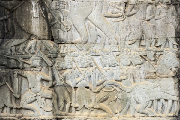 Stone bas-reliefs, Khmer war campaign against the Cham, relief wall, east façade, Bayon temple, Angkor Thom, Siem Reap province, Cambodia