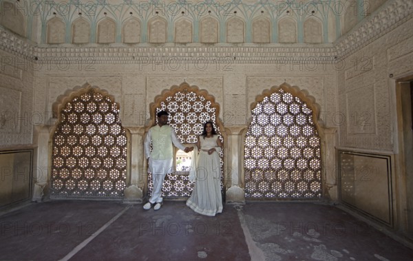 Indian bride and groom at Amber Fort or fortress, Jaipur, Rajasthan, India