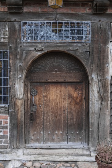 Entrance door to an old half-timbered house, Ammerland farmhouse, Lower Saxony, Germany