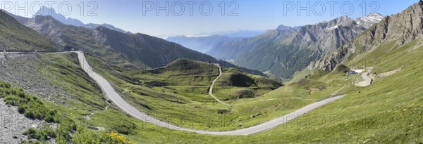 Panoramic view of southern ramp southern ascent mountain road alpine road to third highest asphalted pass in the Alps highest border pass pass in the high Alps alpine pass above tree line 2744 metre high Col d'Agnel, Colle dell'Agnello, Pontechianale, Italy