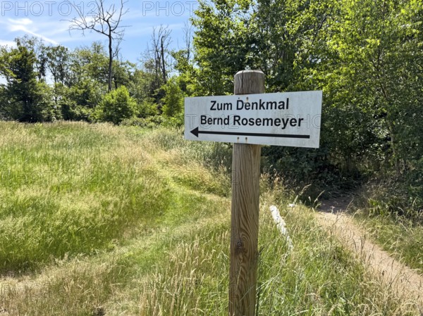 Signpost to memorial for racing driver Bernd Rosemeyer, Mörfelden-Walldorf, Hesse, Germany