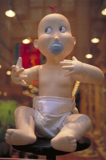 Baby mannequin in a baby equipment shop, New York City, USA