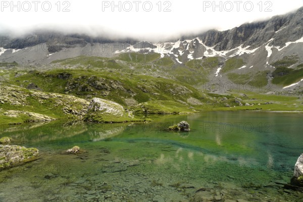 The Lacs des Aires lake in the Cirque de Troumouse basin in the Pyrenees National Park near Gavarnie-GÃ¨dre, France